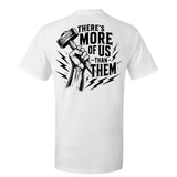 White t-shirt with black graphic and text on the back that says "There is more of us than them."