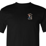 A black short-sleeve crewneck t-shirt featuring a small graphic on the left chest with a skeleton flexing its bicep and the text 'WE BUILD SHIT TOO' in cream.