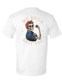 White short-sleeve t-shirt shown from the back, featuring a graphic of a skeleton woman flexing with the text 'WE BUILD SHIT TOO' in a cream circular font.